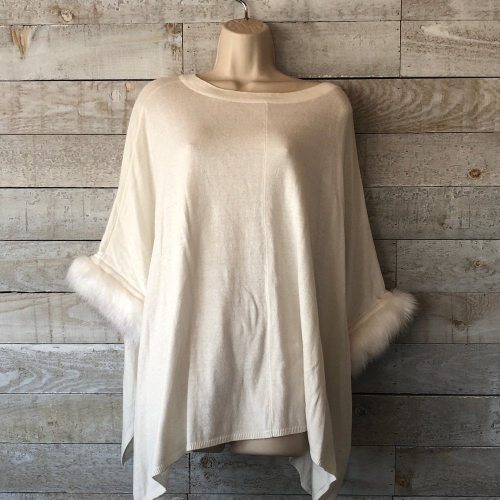 Jennifer Lopez faux fur trim oversized sweater